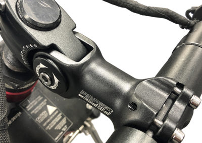 A close-up of the EZRide Accessory Pack handle bar extension installed on the unit